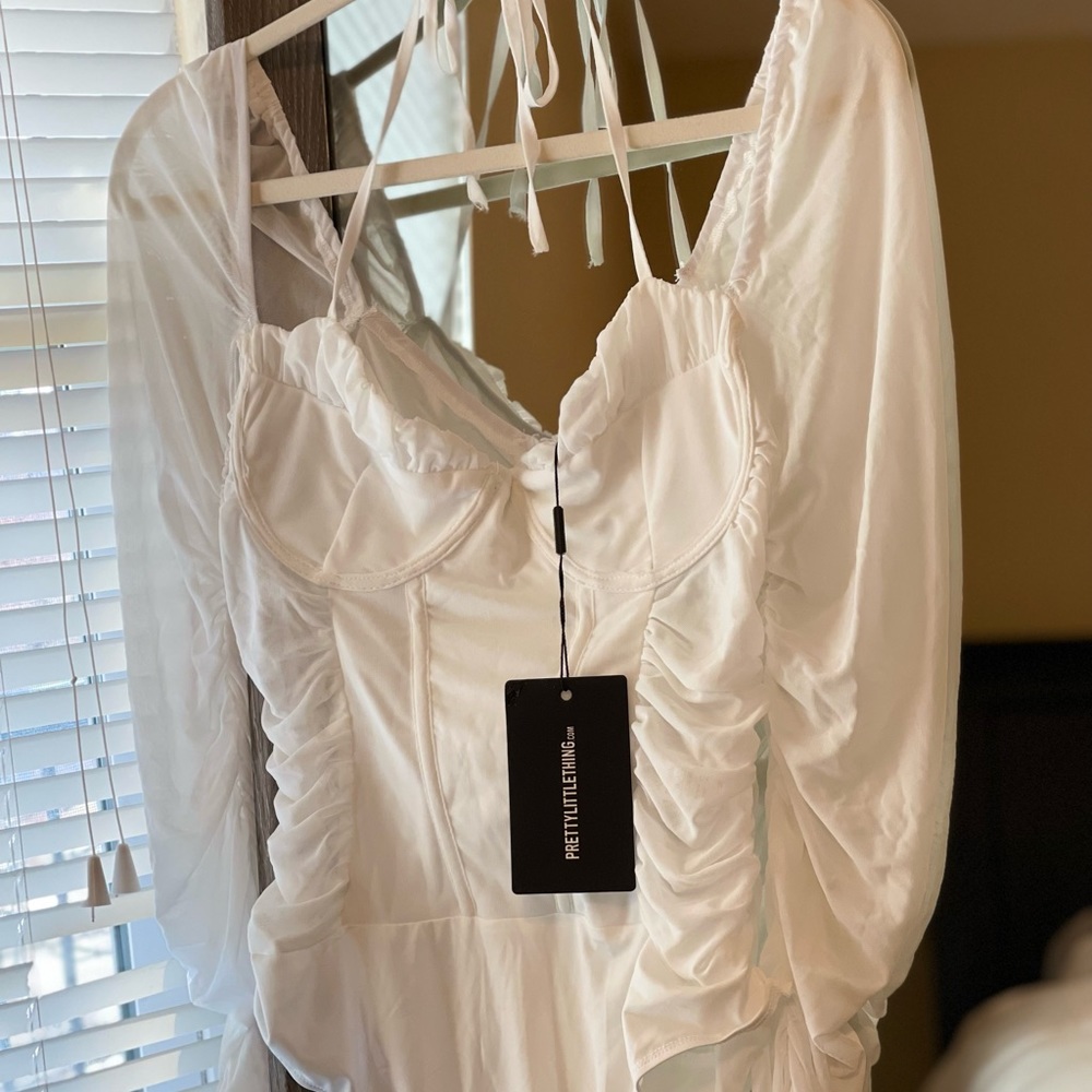 PrettyLittleThing white mesh halterneck detailed long sleeve bodysuit.